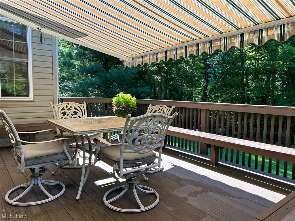 14600 Valentine Road Thompson, OH 44086 - Photo 21 of 31 View of wooden deck and retractable awning awning