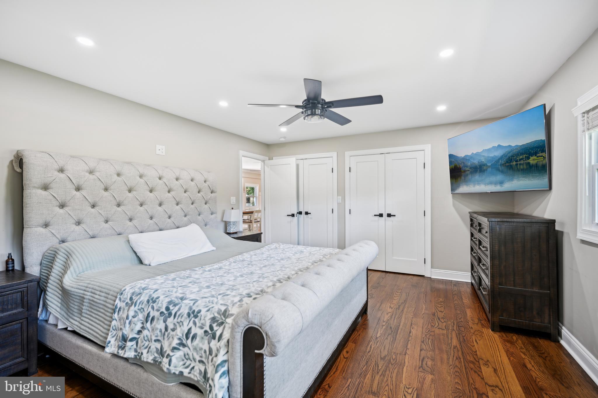 130 Silver Lake Road Bridgeton, NJ 08302 - Photo 18 of 66 a bedroom with a bed and a fireplace