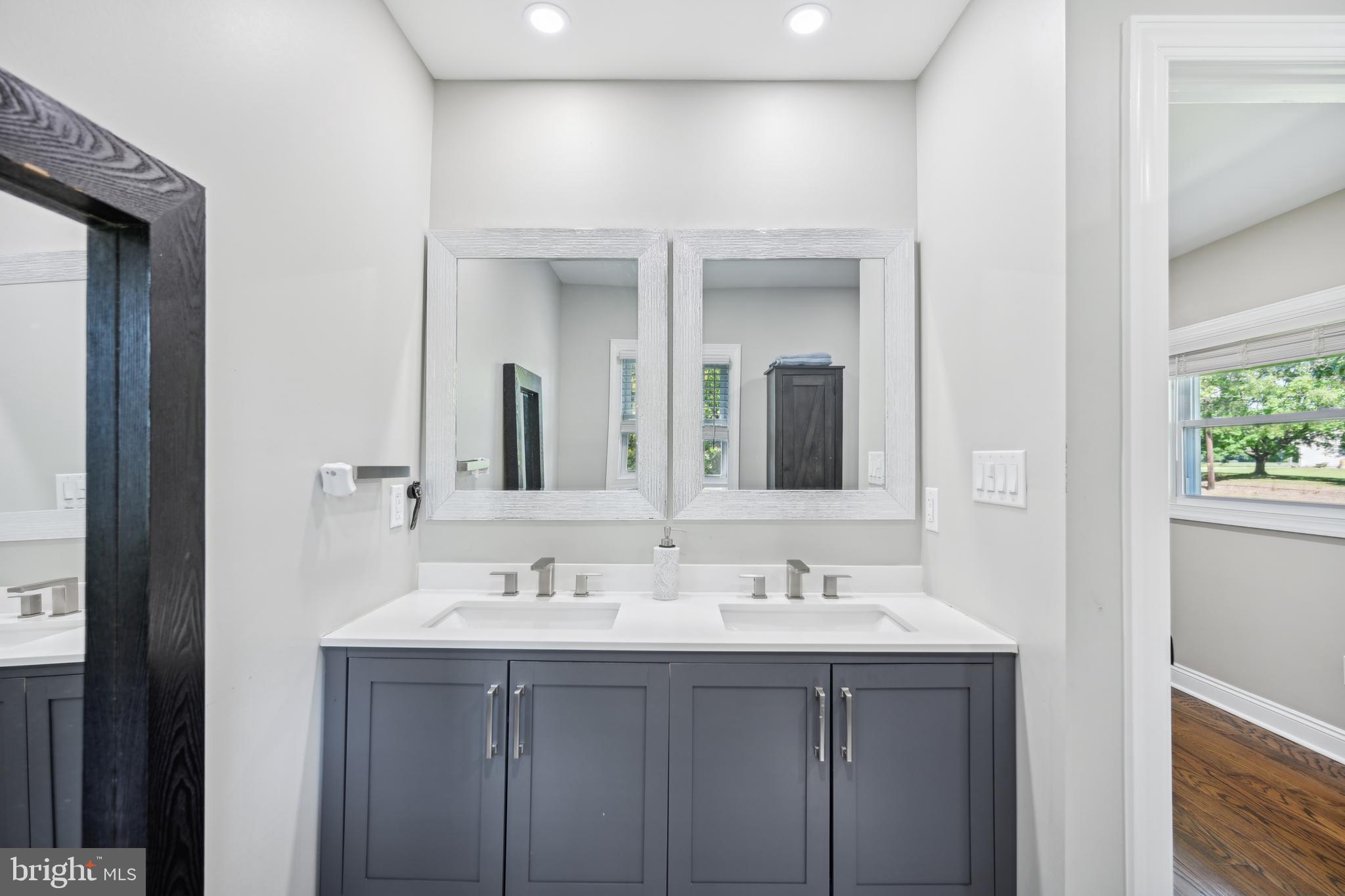 130 Silver Lake Road Bridgeton, NJ 08302 - Photo 28 of 66 a bathroom with a sink and a mirror