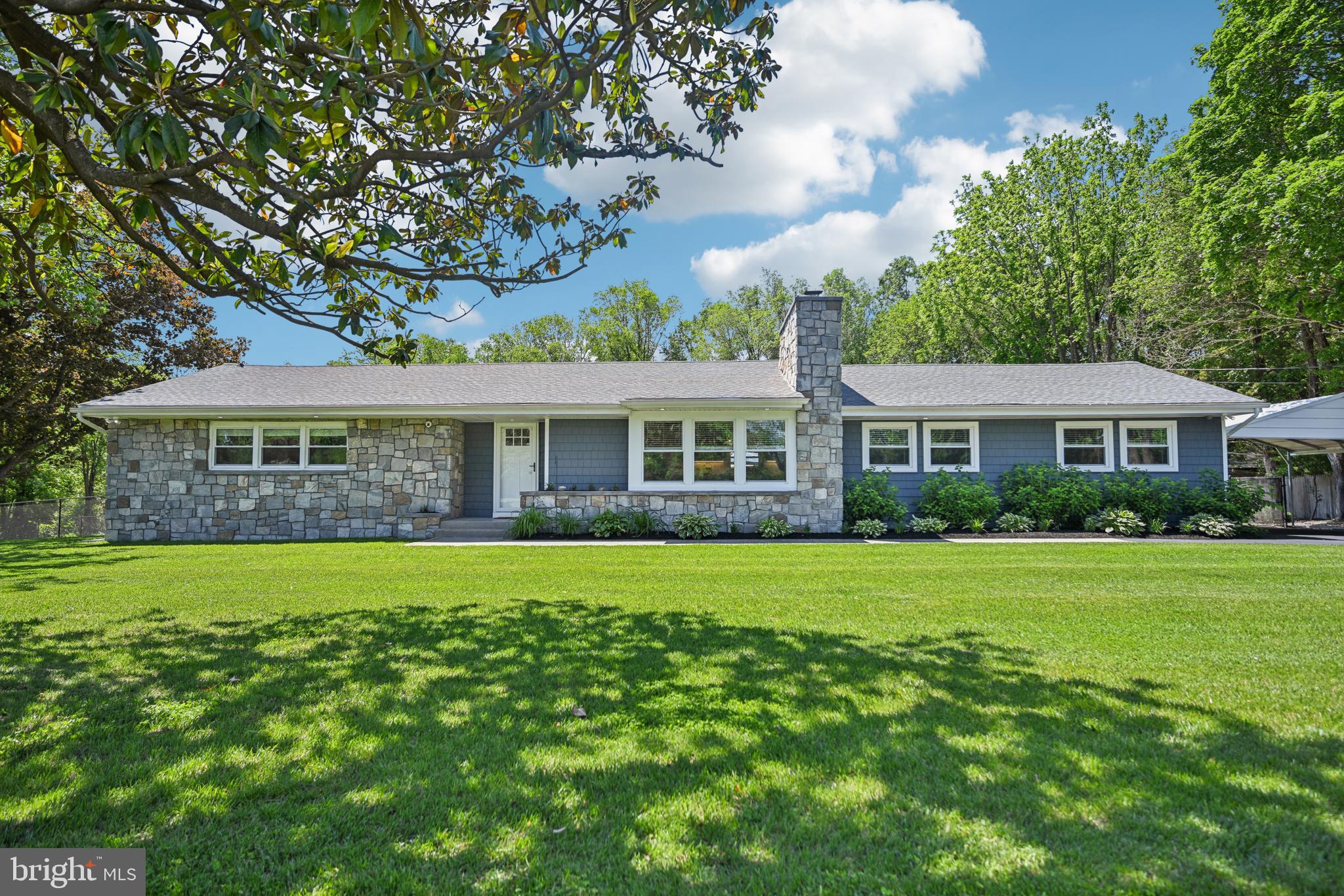 130 Silver Lake Road Bridgeton, NJ 08302 - Photo 3 of 66 a front view of a house with a garden