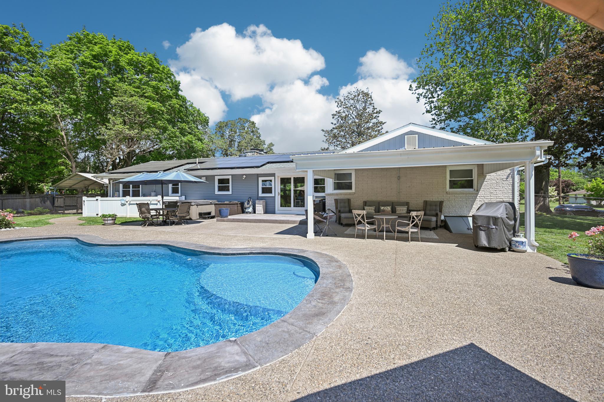 130 Silver Lake Road Bridgeton, NJ 08302 - Photo 41 of 66 a view of a house with swimming pool and sitting area
