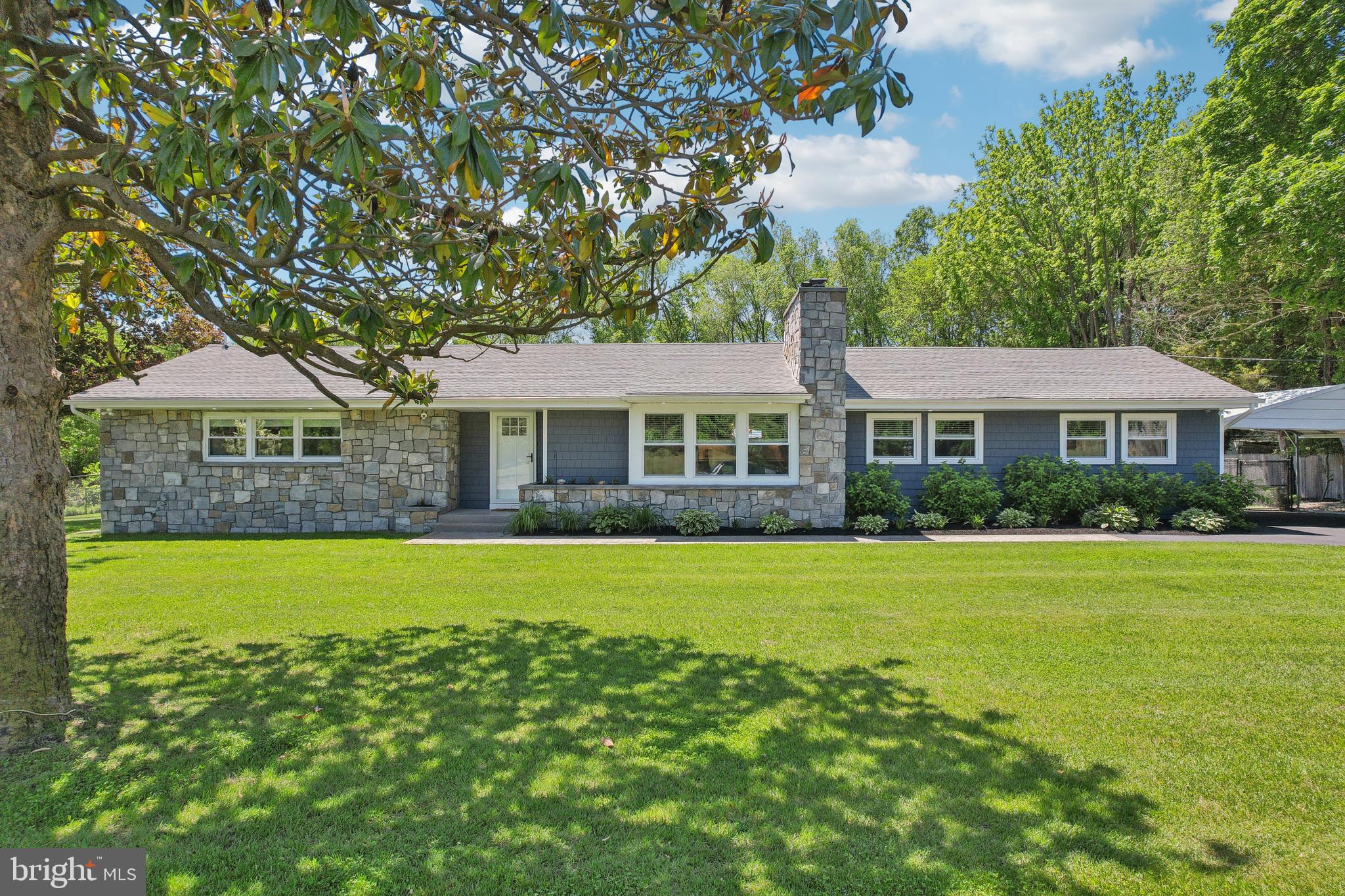 130 Silver Lake Road Bridgeton, NJ 08302 - Photo 44 of 66 a front view of a house with a garden