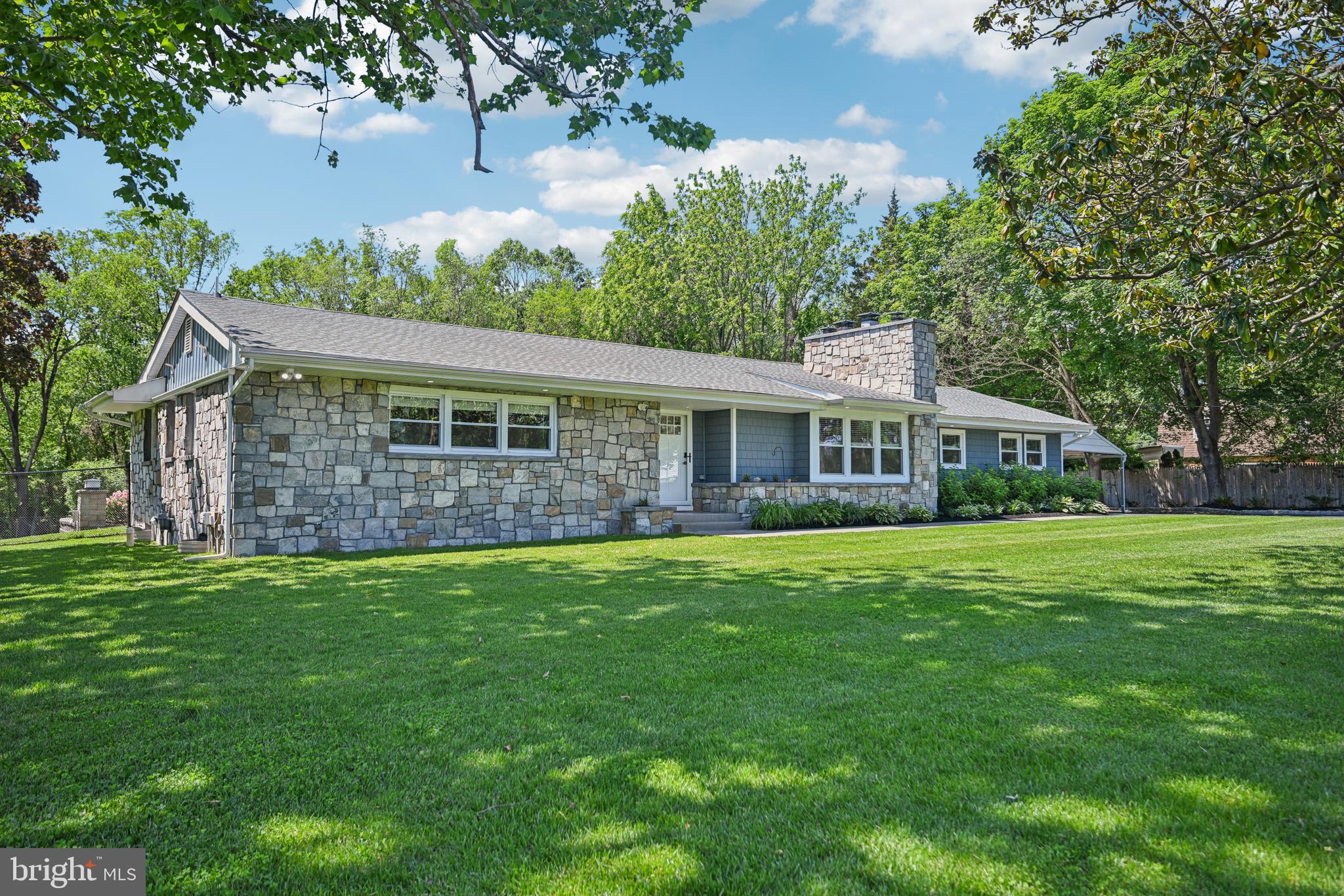 130 Silver Lake Road Bridgeton, NJ 08302 - Photo 5 of 66 a front view of a house with a garden
