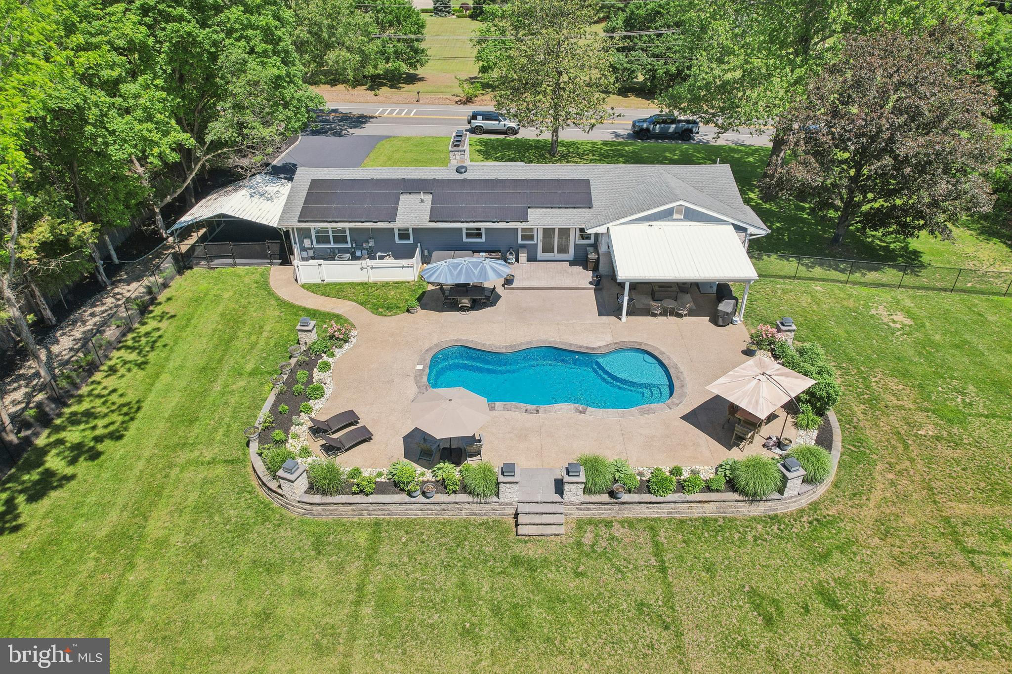 130 Silver Lake Road Bridgeton, NJ 08302 - Photo 51 of 66 an aerial view of a house with outdoor space pool seating area and yard