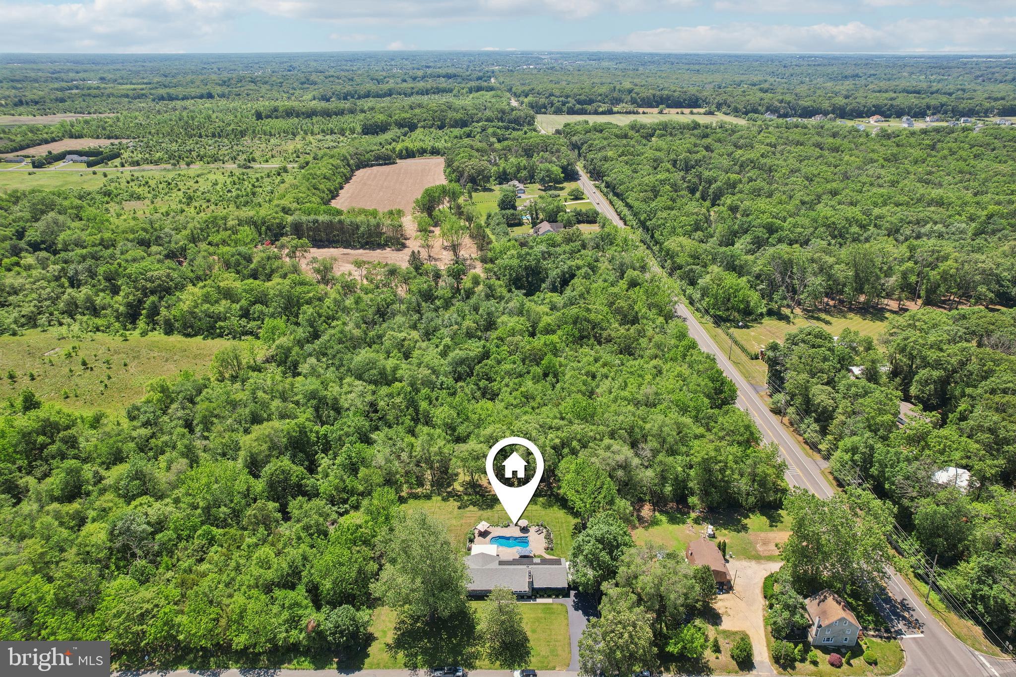 130 Silver Lake Road Bridgeton, NJ 08302 - Photo 58 of 66 an aerial view of a house with a yard and lake view
