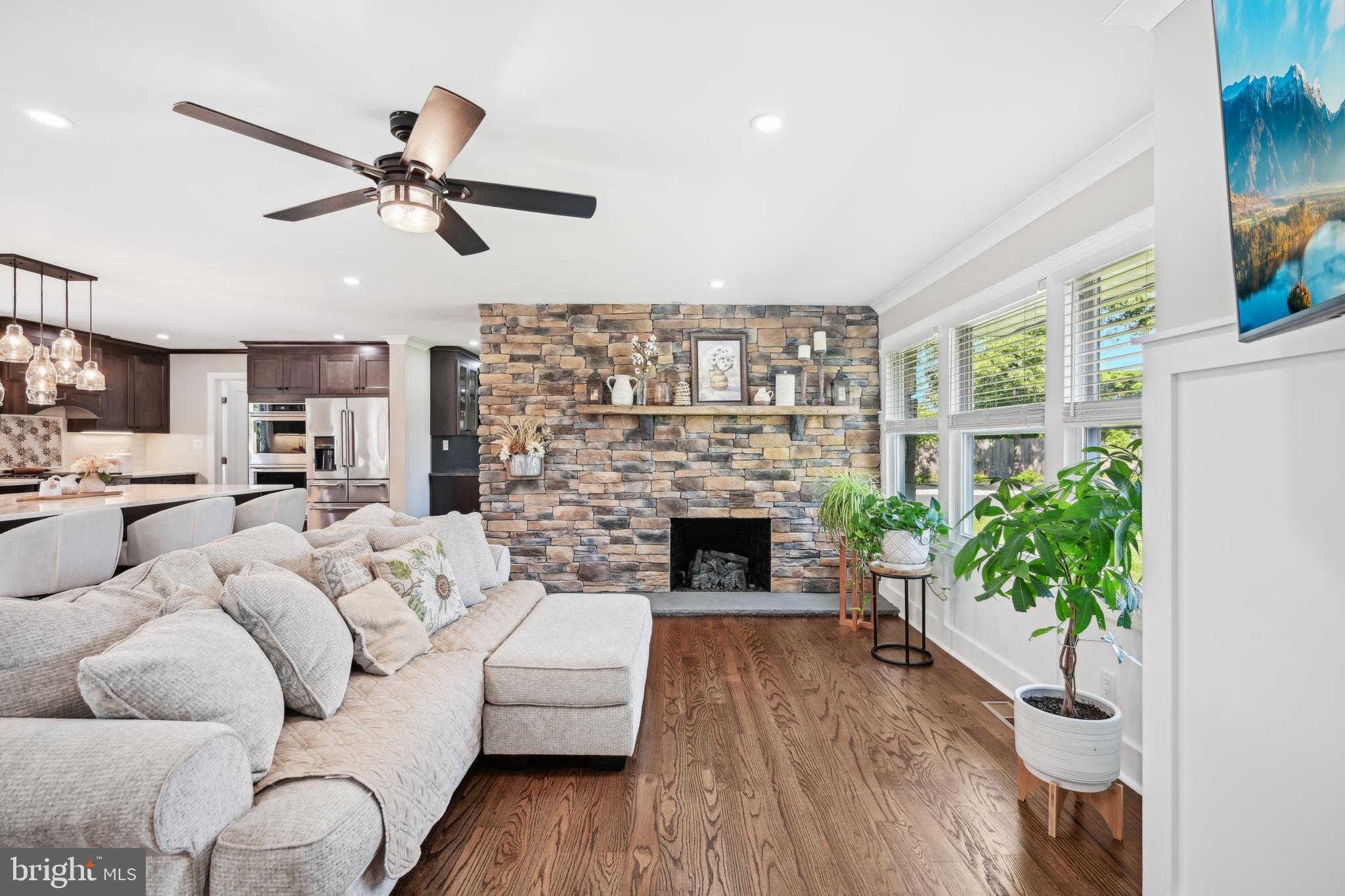 130 Silver Lake Road Bridgeton, NJ 08302 - Photo 10 of 66 a living room with furniture and a fireplace