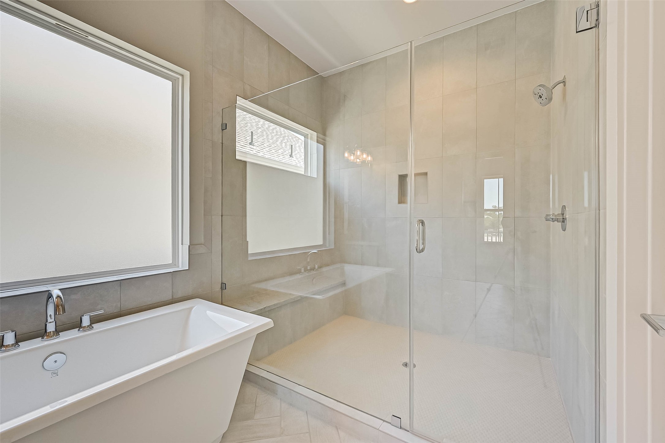67 Thorpe Lane Spring, TX 77389 - Photo 21 of 27 a bathroom with a bathtub and shower