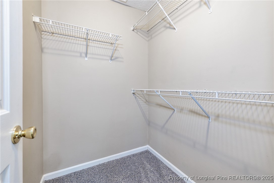 112 Partridge Road Fayetteville, NC 28306 - Photo 23 of 29 a view of a room with racks on the wall