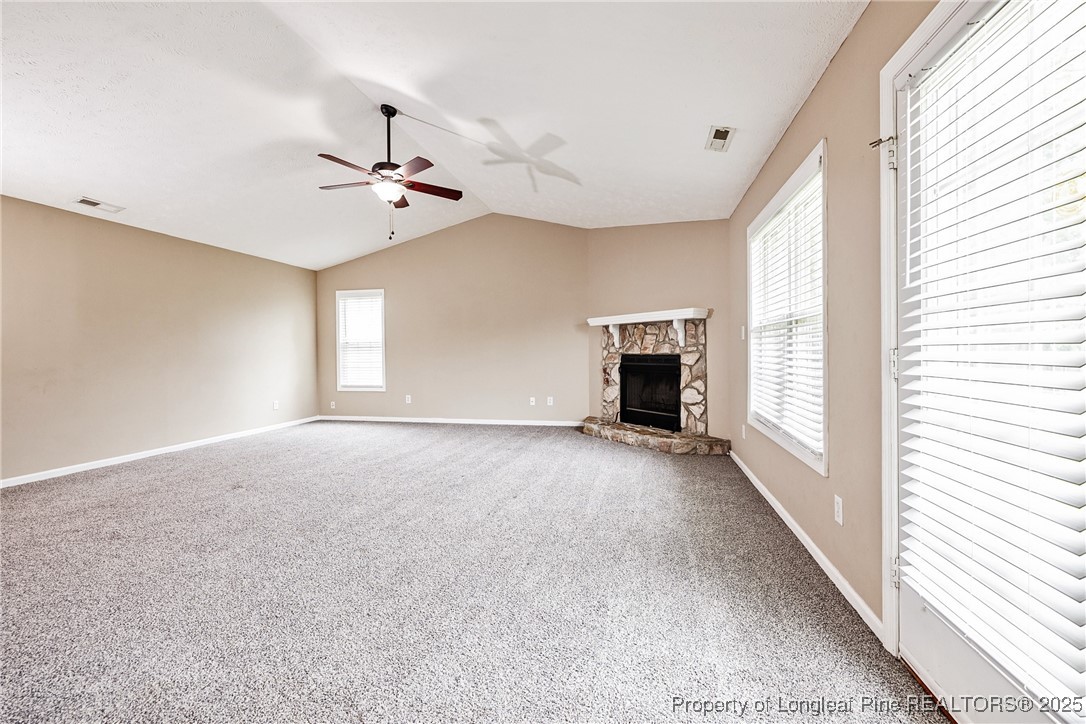 112 Partridge Road Fayetteville, NC 28306 - Photo 6 of 29 a view of empty room with fireplace