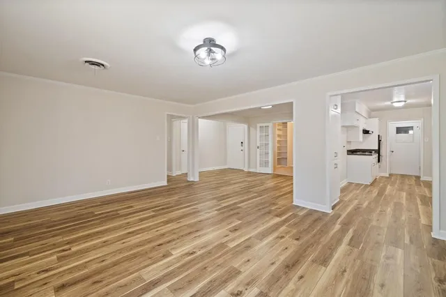 a bathroom with a sink a shower and a mirror