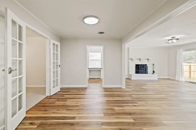 a view of an empty room and window