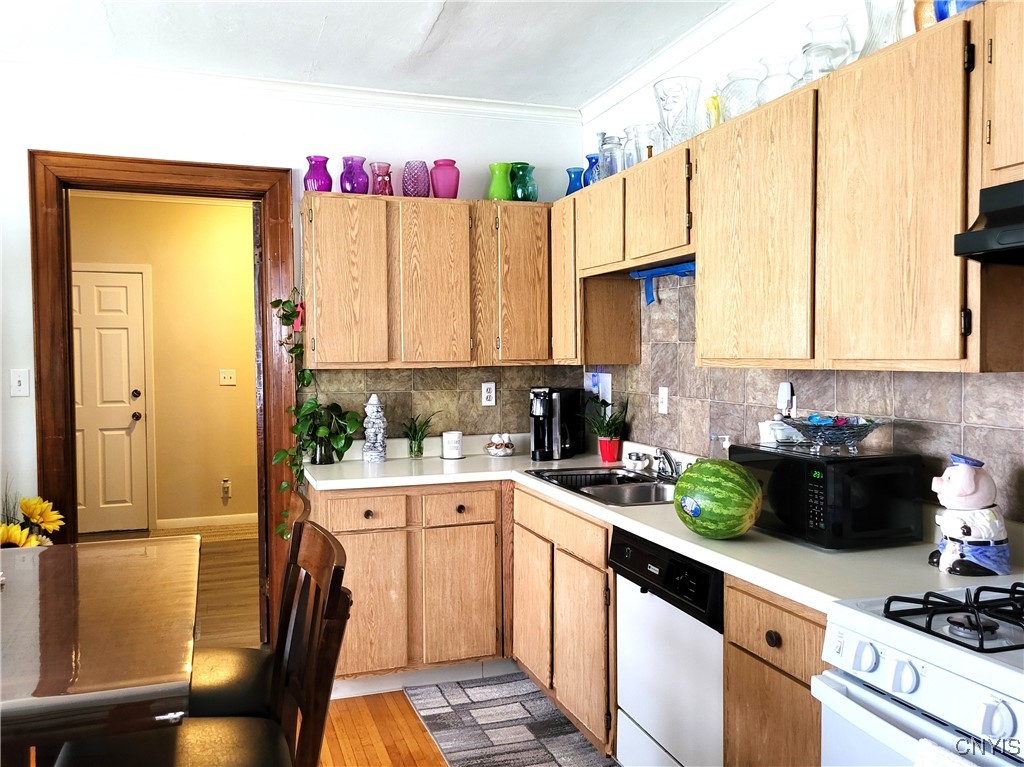 616 Teall Avenue Syracuse, NY 13206 - Photo 10 of 37 and has a large eat in kitchen