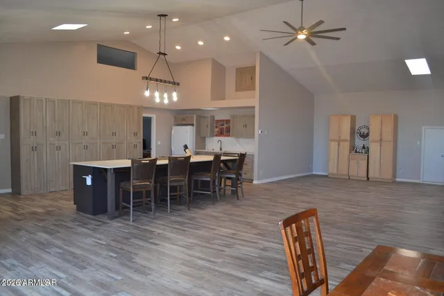 a view of a livingroom with furniture and a fireplace