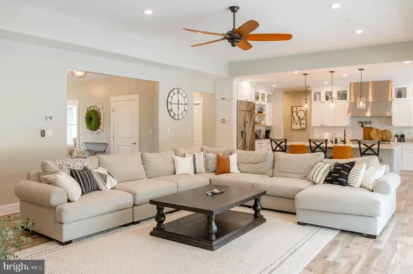 a bathroom with a sink vanity and mirror