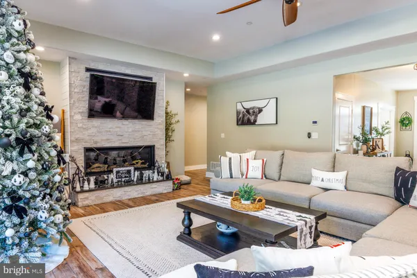 a living room with granite countertop furniture and window