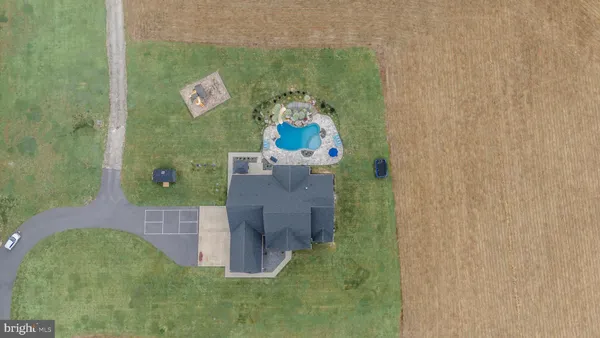 a kitchen with granite countertop a stove and a sink