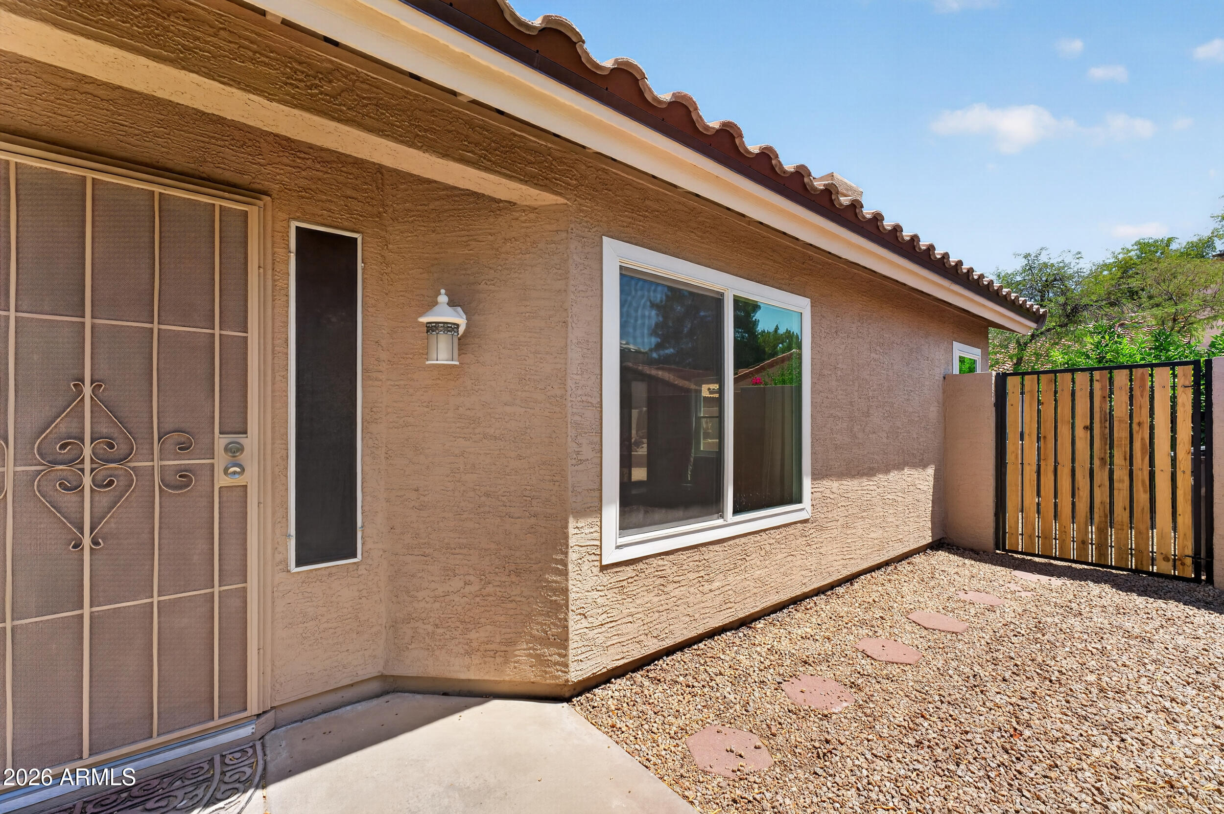 4729 West Monterey Street Chandler, AZ 85226 - Photo 13 of 50 a view of house with backyard porch