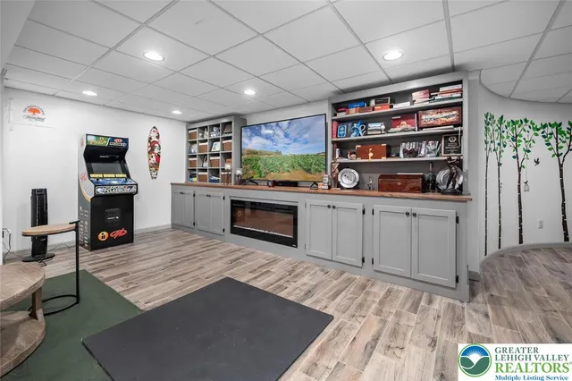 a open kitchen with stainless steel appliances granite countertop a stove and cabinets