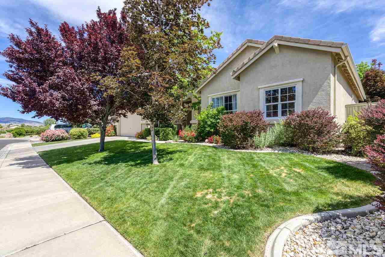1635 Gulch Way Reno, NV 89521 - Photo 3 of 39 a front view of house with yard and green space