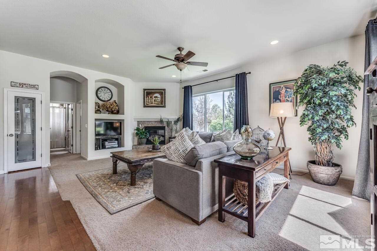 1635 Gulch Way Reno, NV 89521 - Photo 7 of 39 a living room with furniture potted plant and a window