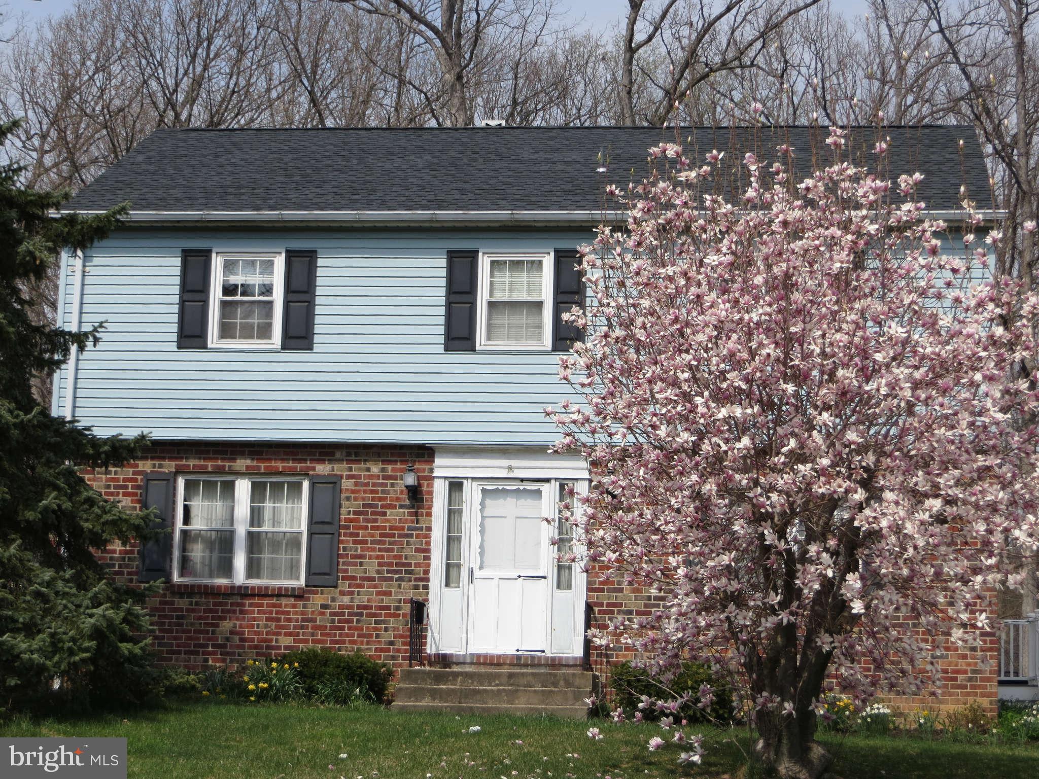 408 Crosby Road Baltimore, MD 21228 - Photo 1 of 17 front view of house with a yard
