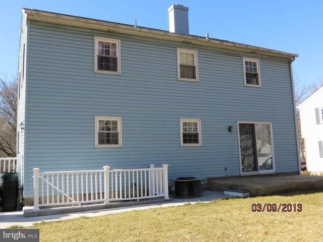 408 Crosby Road Baltimore, MD 21228 - Photo 6 of 17 a front view of a house with a yard
