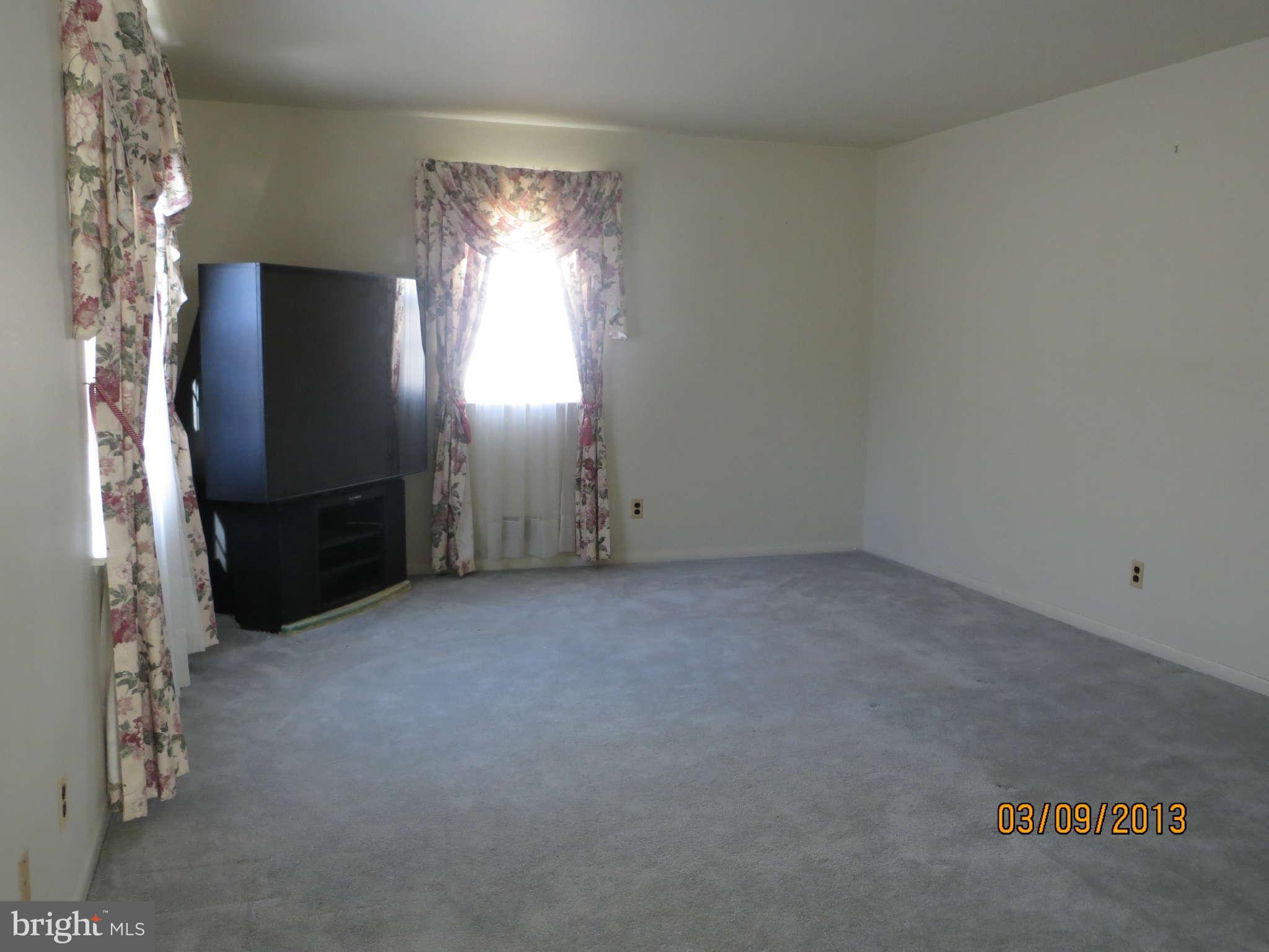 408 Crosby Road Baltimore, MD 21228 - Photo 10 of 17 a view of empty room with window