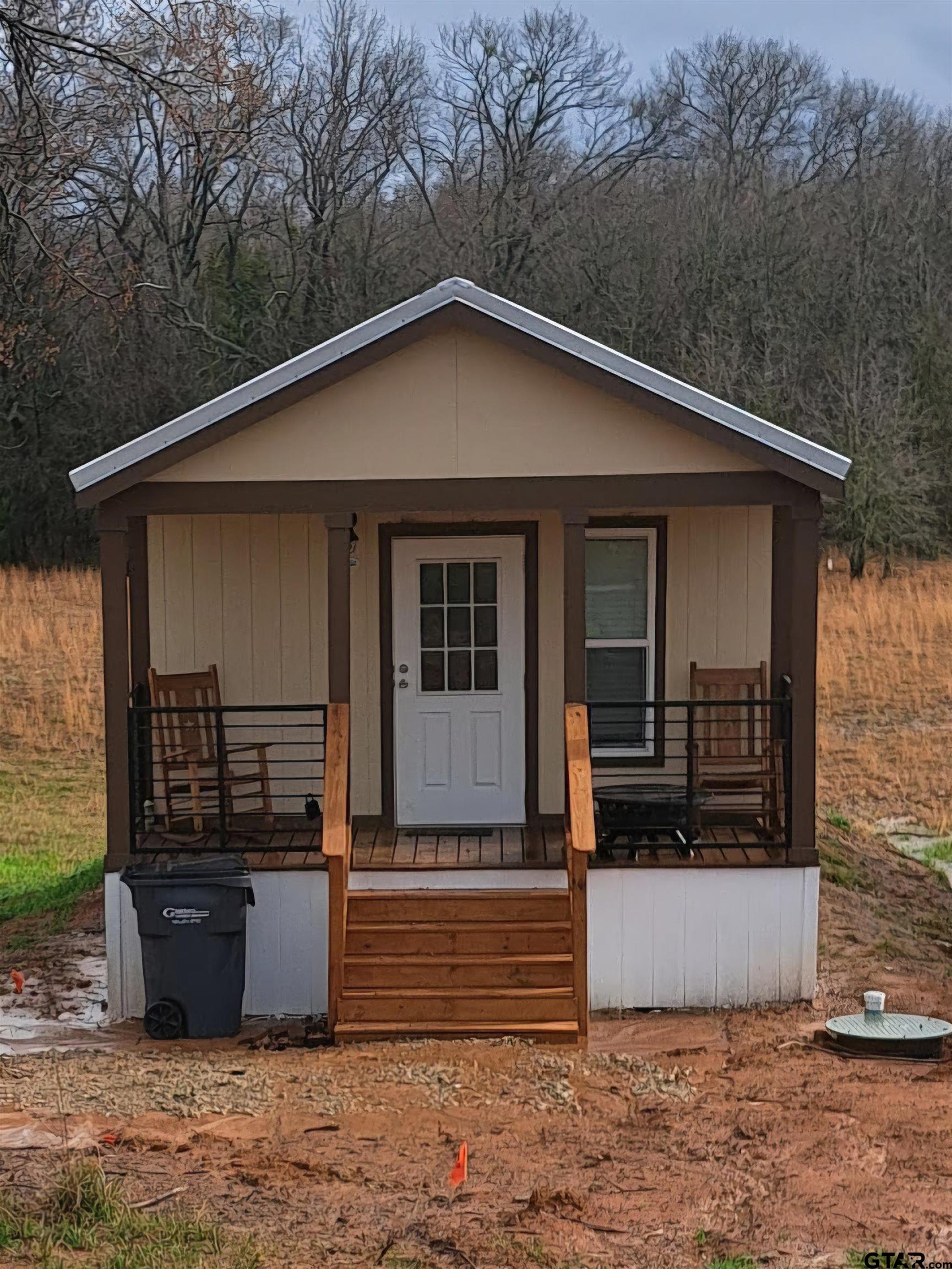 281 Indian Gap Quitman, TX 75783 - Photo 25 of 30 a view of a house with yard