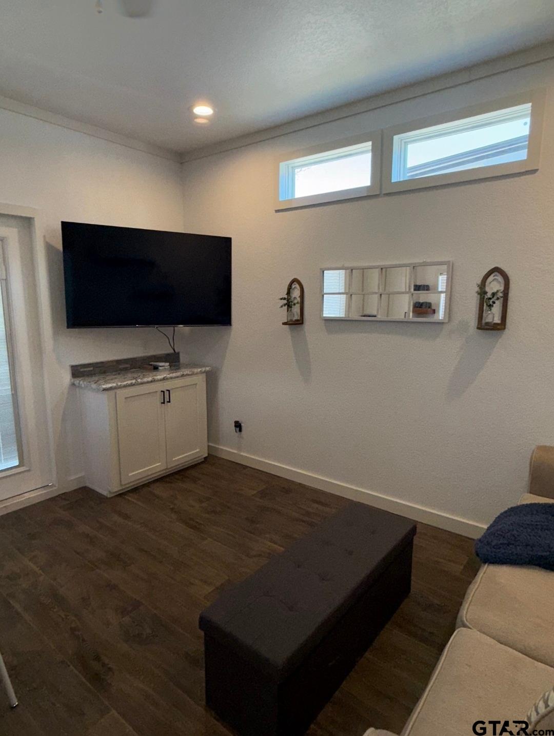 281 Indian Gap Quitman, TX 75783 - Photo 8 of 30 a living room with furniture and a flat screen tv