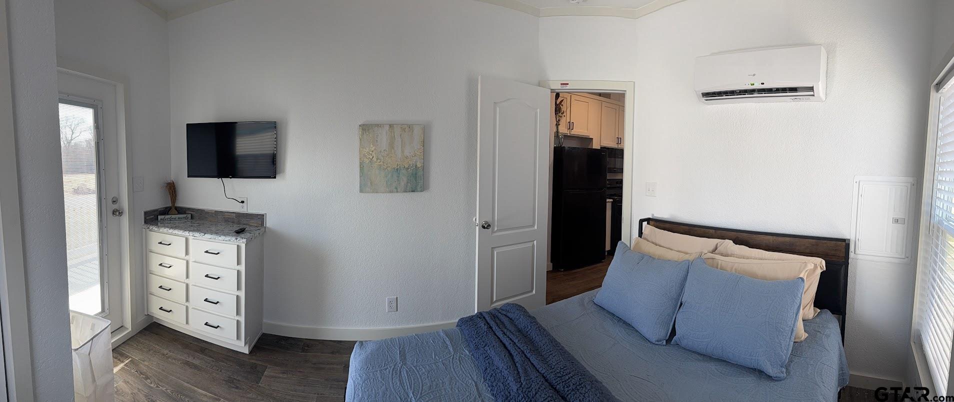 281 Indian Gap Quitman, TX 75783 - Photo 10 of 30 a living room with furniture and a flat screen tv