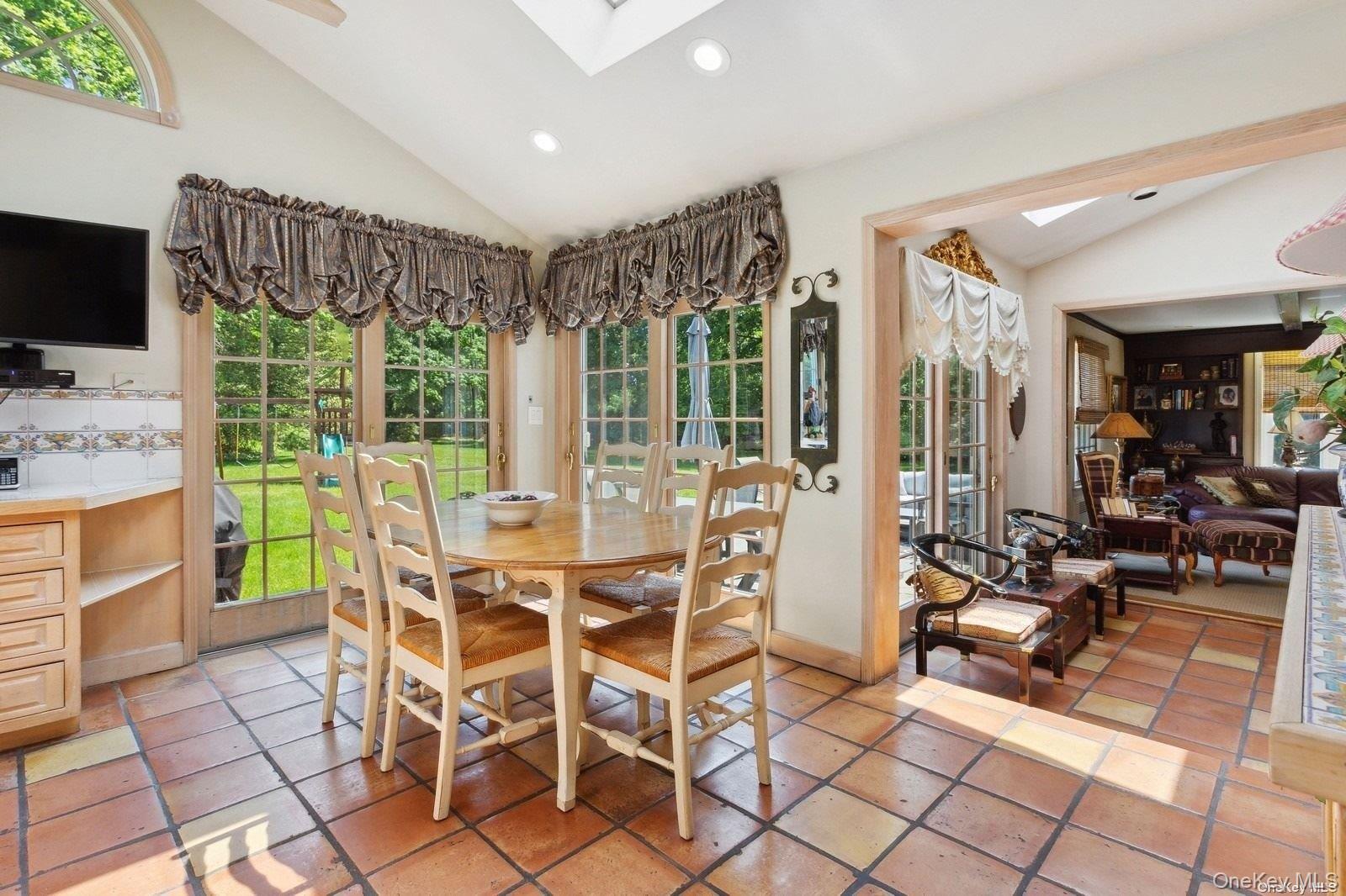 1345 Harbor Road Hewlett, NY 11557 - Photo 16 of 36 a view of a dining room with furniture window and outside view