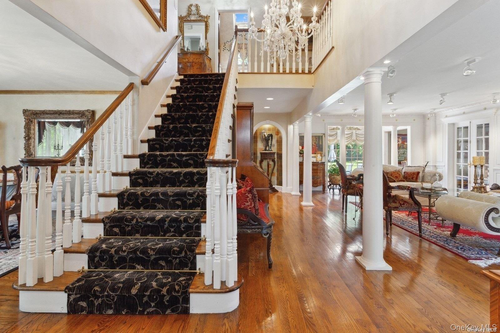 1345 Harbor Road Hewlett, NY 11557 - Photo 7 of 36 a view of entryway and hall with wooden floor