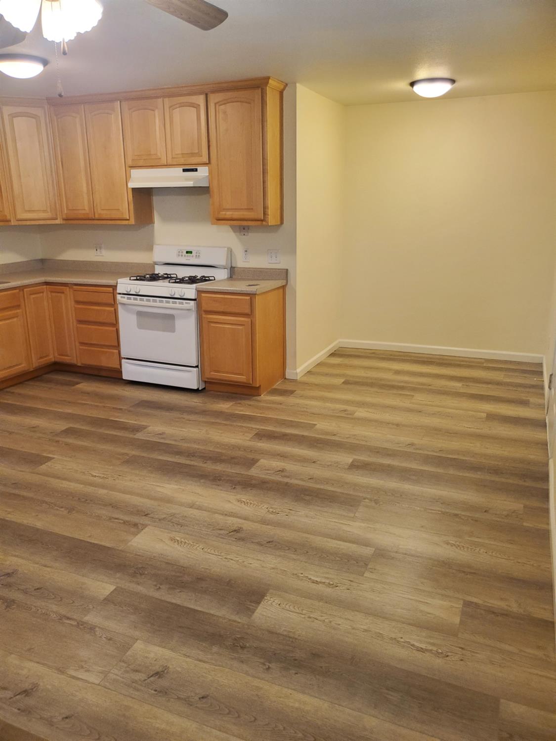 5817 Keyntel Street Citrus Heights, CA 95621 - Photo 23 of 30 a view of kitchen with stainless steel appliances granite countertop a sink stove and cabinets