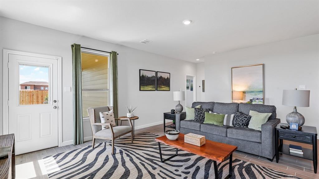 116 Daffodil Lane Boyd, TX 76023 - Photo 10 of 37 a living room with furniture and wooden floor