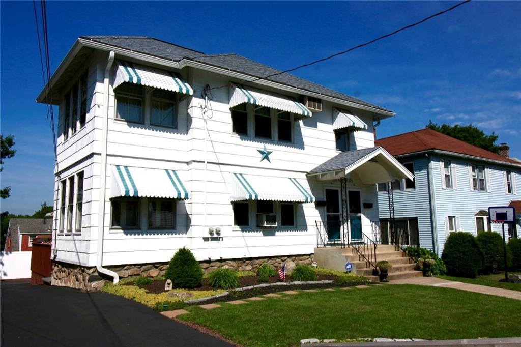 14 Hudson Street Waterbury, CT 06708 - Photo 1 of 1 a front view of a house with a yard