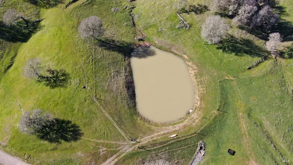an aerial view of a swimming pool