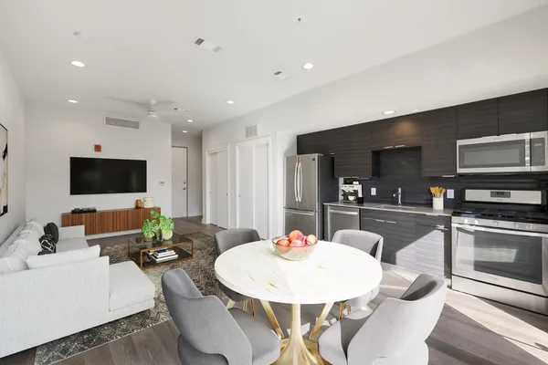 a view of a dining room with furniture