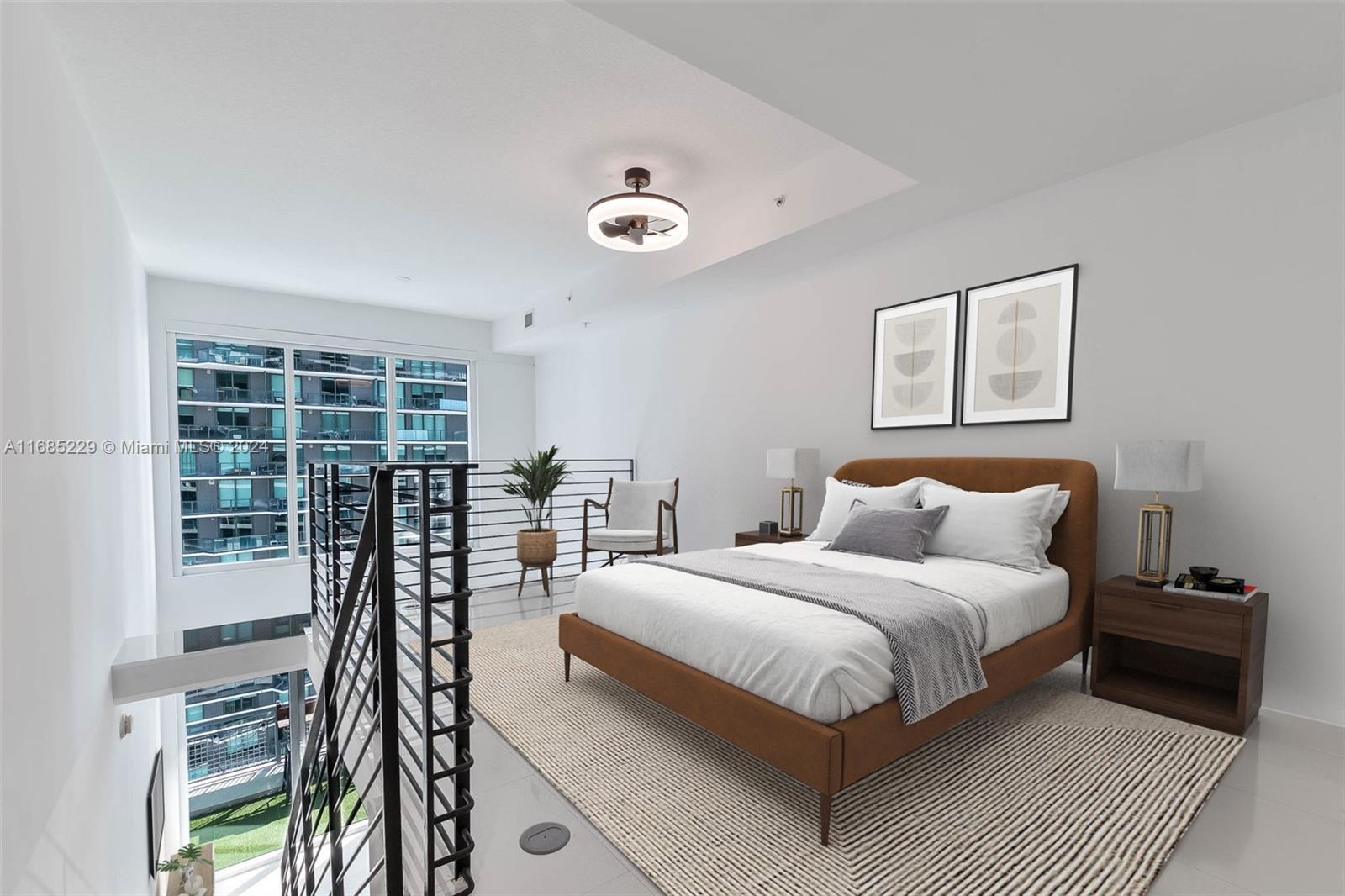 60 Southwest 13th Street, Unit 2618 Miami, FL 33130 - Photo 2 of 24 a bedroom with a bed furniture and a large window