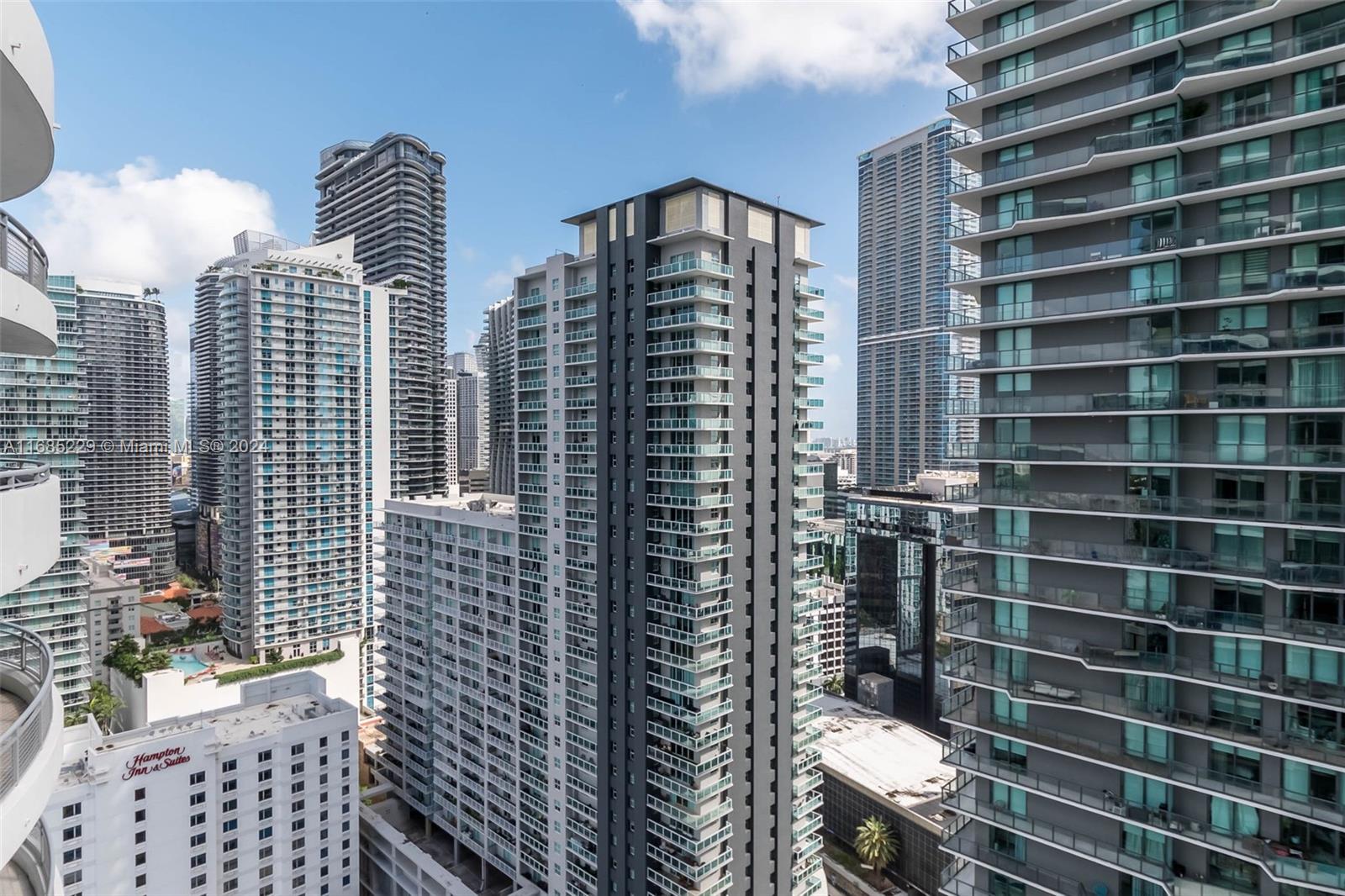 60 Southwest 13th Street, Unit 2618 Miami, FL 33130 - Photo 21 of 24 a bathroom with a toilet and a shower