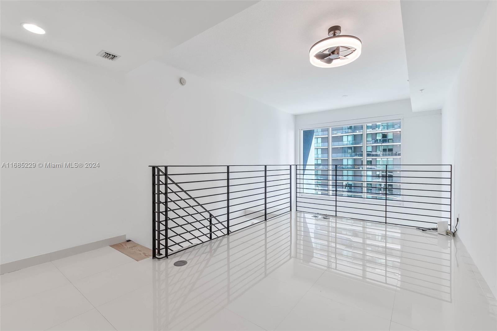 60 Southwest 13th Street, Unit 2618 Miami, FL 33130 - Photo 8 of 24 a view of entryway with stairs