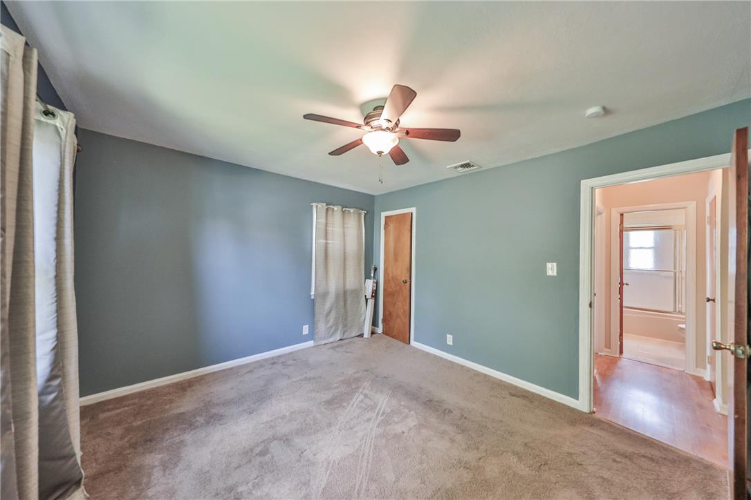 3050 Cornwall Road Bethlehem, PA 18017 - Photo 32 of 80 A comfortable bedroom features carpet flooring and a practical ceiling fan for year-round comfort.