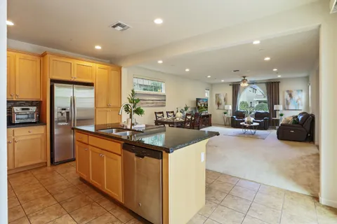 a kitchen with stainless steel appliances lots of counter top space