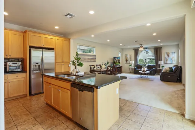 a kitchen with stainless steel appliances lots of counter top space
