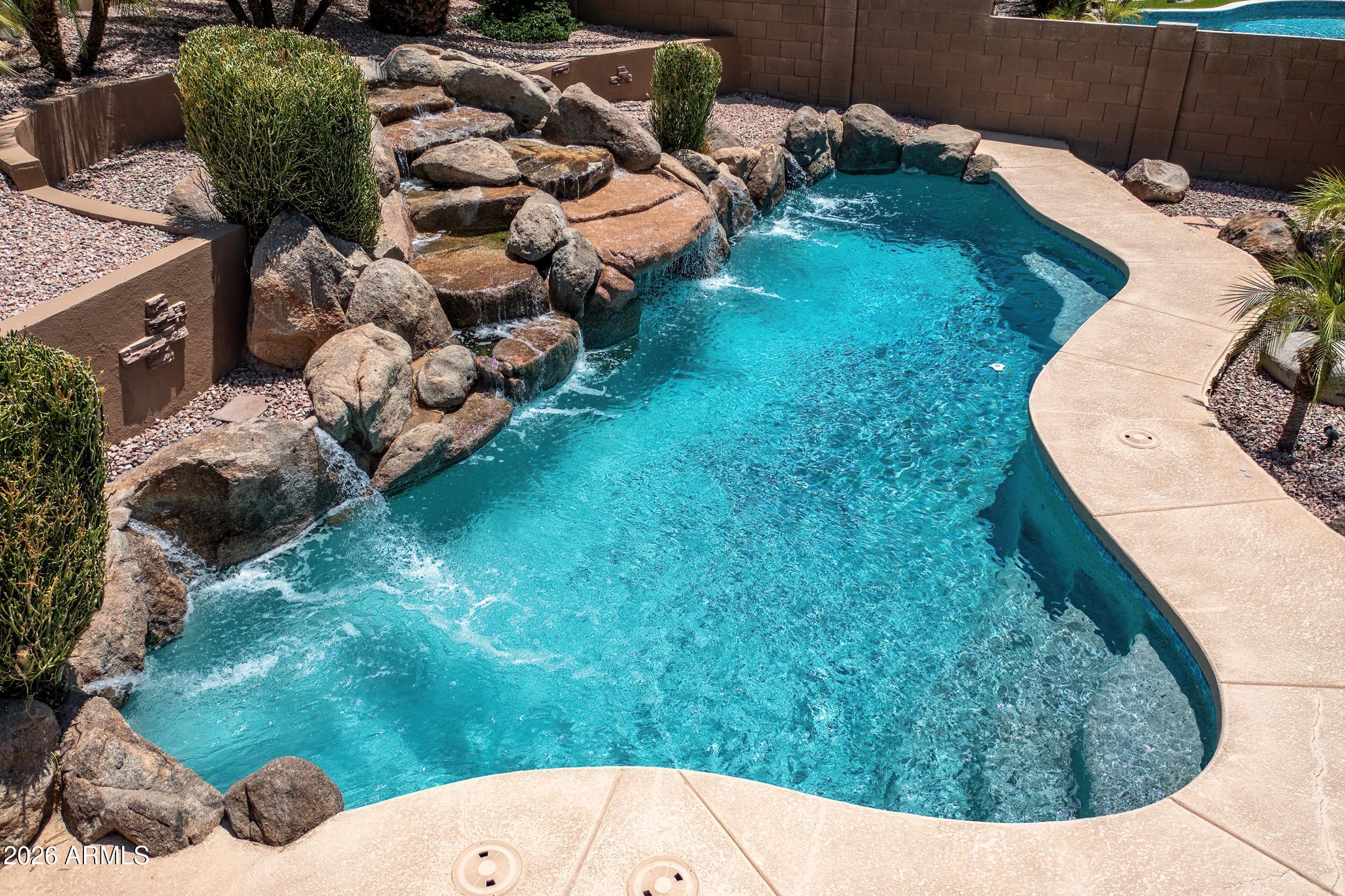 3416 West Montello Road Phoenix, AZ 85086 - Photo 51 of 68 Play pool with waterfall