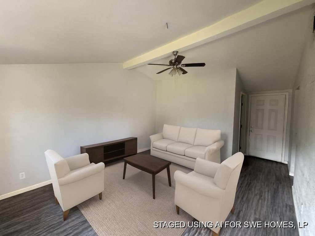 1301 Truman Street Cleveland, TX 77327 - Photo 4 of 11 a living room with furniture and a wooden floor