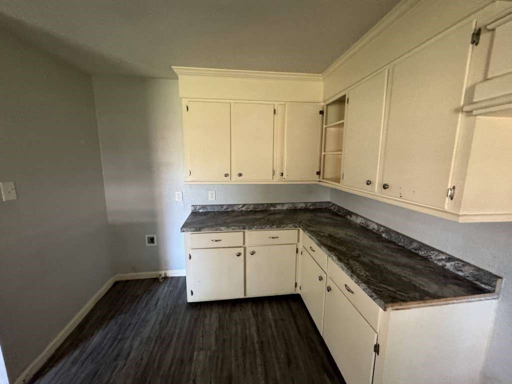 1301 Truman Street Cleveland, TX 77327 - Photo 6 of 11 a kitchen with a sink and cabinets