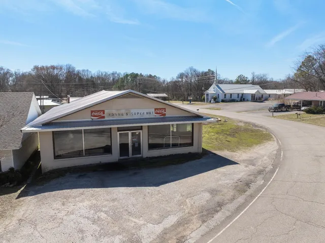 a view of swimming pool with a yard