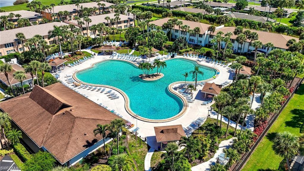 3563 Antarctic Circle, Unit 2102 Naples, FL 34112 - Photo 23 of 26 an aerial view of a house with outdoor space pool patio and outdoor seating