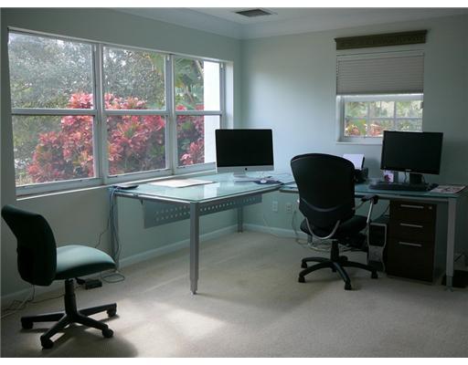 7149 Encina Lane Boca Raton, FL 33433 - Photo 15 of 22 a view of a workspace with furniture and a window