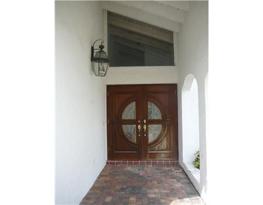 7149 Encina Lane Boca Raton, FL 33433 - Photo 2 of 22 a view of a entryway door